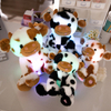 လက်ဆောင်အတွက် စိတ်ကြိုက် LED Plush အရုပ်ထည့်ထားသော တိရစ္ဆာန်နွားအရုပ်